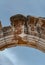 Temple of Hadrian detail in Ephesus Ancient City, Turkey. Relief statue of Tyche Fortuna on keystone on arch