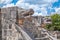 Temple with the head of the snake god Kukulkan at Chichen Itza in Mexico