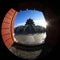 The Temple of Heaven in Beijing, China, under the blue sky and white clouds photographed by fisheye lens
