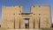 The Temple of Horus in Edfu. A high wall with huge carvings