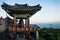 Temple house with bell at Sanbanggulsa temple after sunset, Sanbang-ro, Jeju Island, South Korea