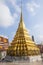 Temple Phra Sri Ratana Chedi covered with foil gold in the inner Grand Palace in Bangkok