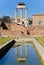 Temple pillars reflected in pool