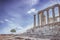 The Temple of Poseidon and a tree. Cape Sounion, Greece. Soft focus