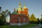 Temple of the Resurrection Skete of the Valaam Monastery. Red brick building, hermitage in the middle of the forest on a summer