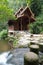 temple and walk path over waterfall and river in forest