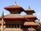 Temples of Patan with red roofs. Ancient city in Kathmandu valley. Picturesque Nepal cityscape