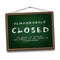 Temporarily closed sign of coronavirus news on Green chalkboard in wooden frame.