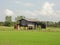 Temporary accommodation for farmers among the green rice fields