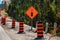 Temporary road signs and orange barrels
