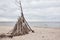 Temporary wood shelter on an empty beach