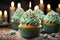 Tempting birthday treat Cupcake with blue candle, heart, and green crown cupcakes