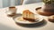 a tempting caramel Biscoff cheesecake displayed on a white table, accompanied by a slice and a cup of tea or coffee,the