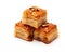 Tempting pieces of baklava on a white background, Generative AI