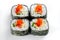Tempura roll with salmon and red caviar isolated on white. Hot sushi rolls