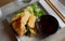 Tempura with vegetables in batter.