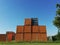 Ten containers piled up with a blue sky background