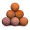 Ten rusty iron cannon balls on white background