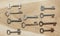 Ten symmetrically arranged keys on a wooden background.