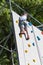 Ten Years Boy Climbing Outdoor Artificial Wall with Modern Colorful Holds