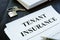 Tenant insurance policy, key and pen