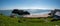 TENBY,SOUTH WALES APRIL 2021-Panorama View of Tenby beach Wales uk in summer with tourists and visitors, blue sea and