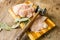 Tender chicken fillet and hammer for meat