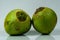 Tender coconuts on a white table