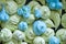 Tender color meringue dessert background. green and blue french candy. whipped egg white.