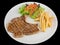 Tender grilled porterhouse or t-bone steak served with golden Fr