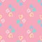 Tender heart ornament seamless pattern. Romantic print with blue, yellow and white valentine silhouettes on pink background