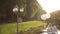 Tender moment of happiness and love. Young beautiful wedding couple with balloons embracing on the bridge sunset river