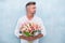 Tender tulips for her. For someone special. Man with tulips bouquet. Handsome man holding pink tulips. Attractive man