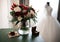 Tender weddingday. Wedding bouquet and blurred wedding dress