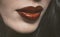 Tender young female with dark red lips closeup. Young female model with professional make-up. Fashion, beauty, makeup