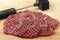 Tenderized raw minute steaks