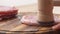 Tenderizing Pork Chops on Wooden Board.