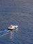 Tenders ferry passengers from cruise ship to  Santorini