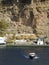 Tenders ferry passengers from cruise ship to  Santorini