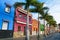 Tenerife. Colourful houses and palm trees on street in Puerto de