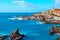 Tenerife island, aerial view of a small town, village with colorful buildings on a summer day. Seaside resort.