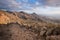 Tenerife mountain landscape. Trekking path. Adeje and Las Americas coastline in the background.