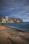 Tenerife shoreline with a beach, cliffs and buildings