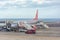 Tenerife, Spain - March 21, 2021: Passengers exit the plane with the inscription Friendly Low Fares