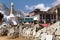 Tengboche monastery with stupa and prayer mani wall