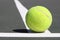 Tenis ball on white line