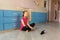 Tennage girl doing fitness gymnastics at home. Gymnastics exercises video tutorial. Children`s activity in quarantine during