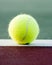 Tennis Ball on baseline of court