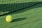 Tennis ball on blur net