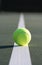 Tennis Ball on the court line